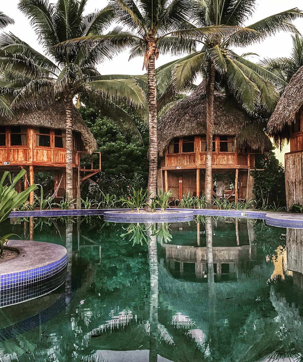 swimming-pool-against-huts